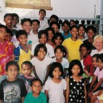 Susan with orphaned children at Christmas