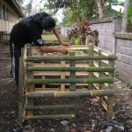 GCC staff completing bamboo compost bin (ENP)